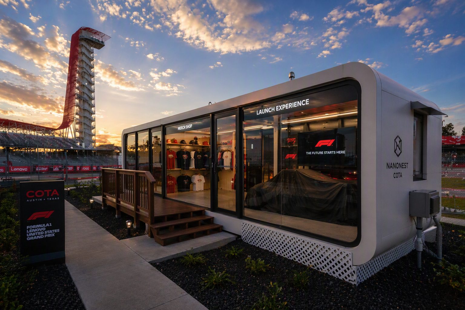 NanoNest branded merch-shop activation beside a racetrack at sunset