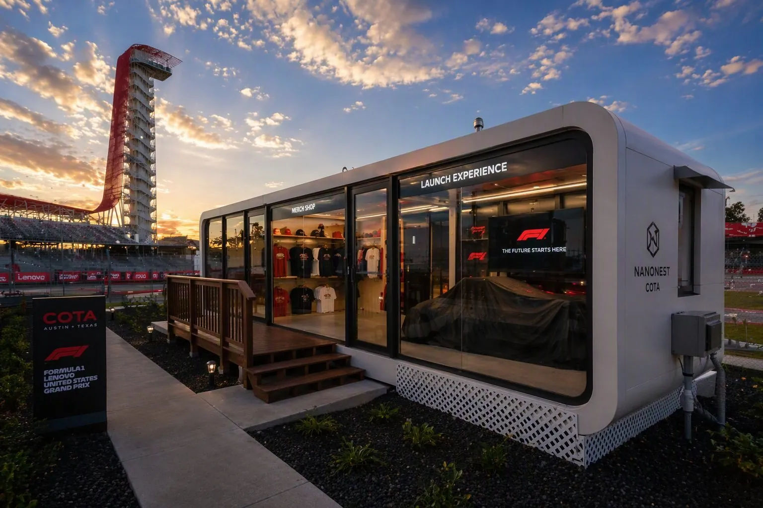 NanoNest branded merch-shop activation beside a racetrack at sunset