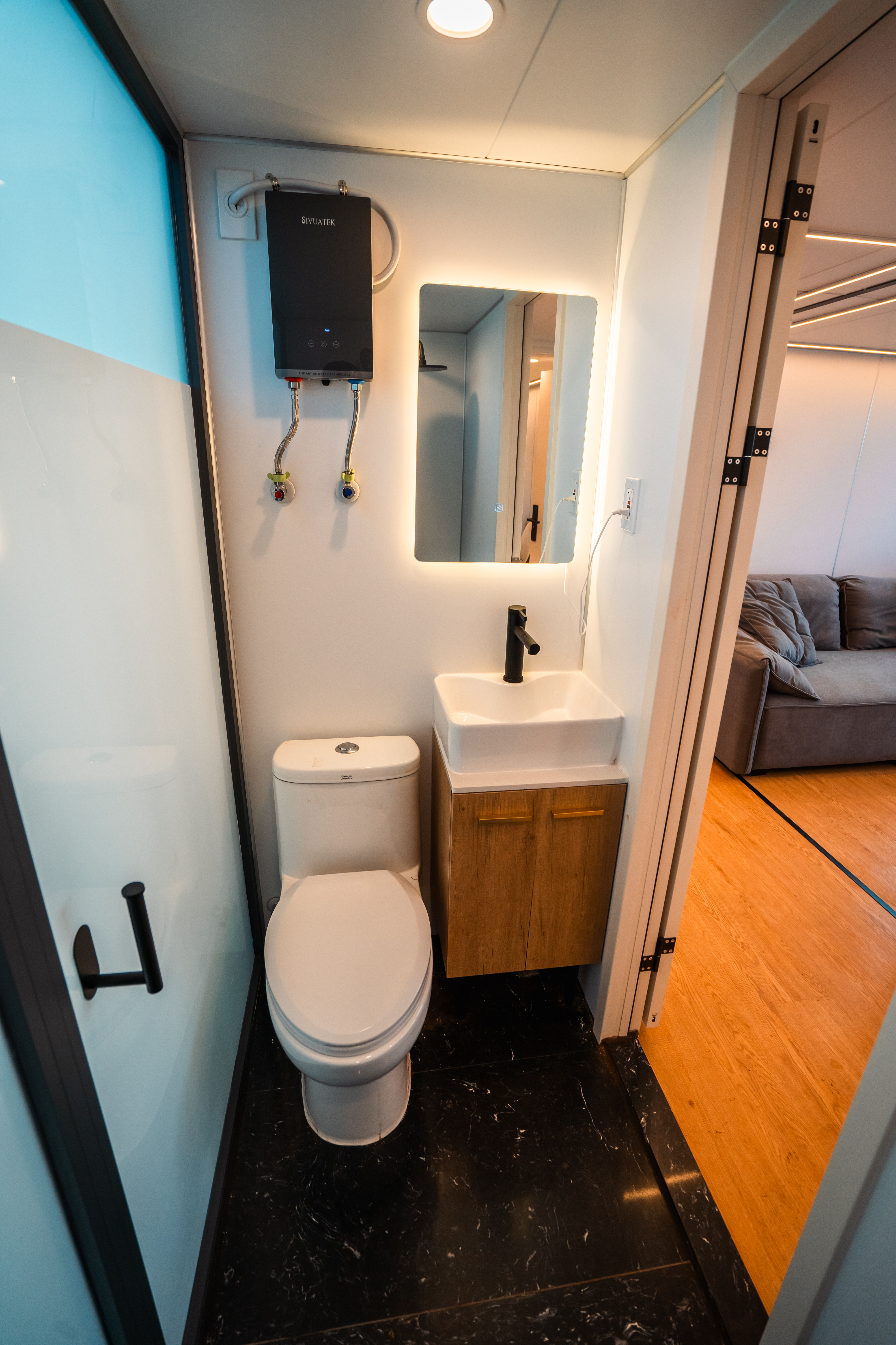 Double Unit bathroom — LED mirror, vessel sink, toilet