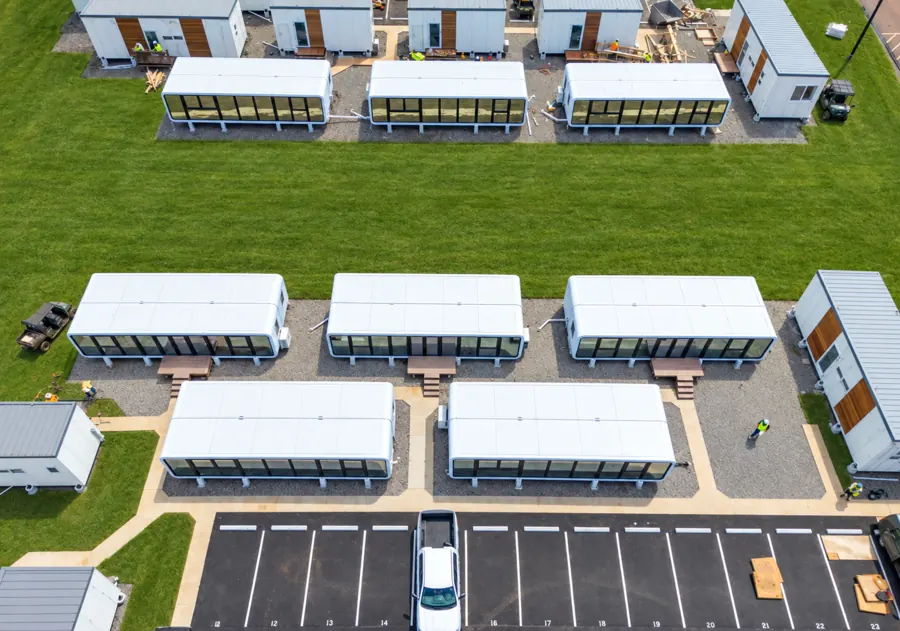 Aerial view of NanoNest modular units on gravel pads at the Lahaina housing site in Maui