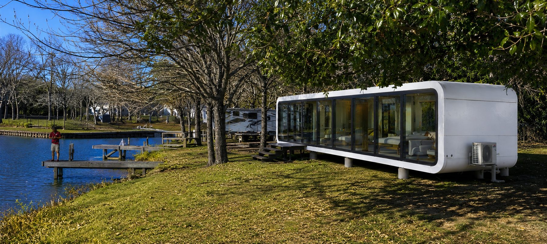 Lakeside modular RV park cabin with glass walls among the trees